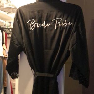 Black silk robe inscribed with “bride tribe”